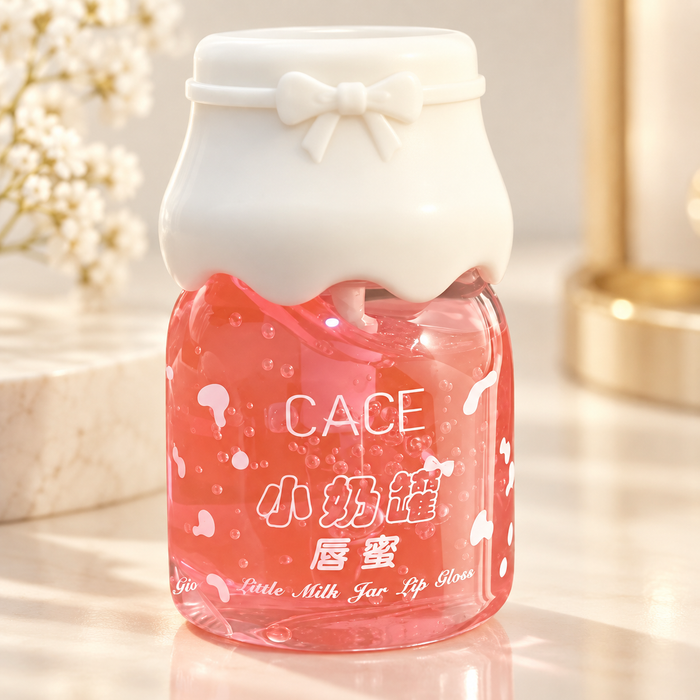 CACE pink lip gloss bottle with ivory bow lid