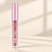 Metallic pink lip colour bottle with a textured pink cap on an ivory surface.