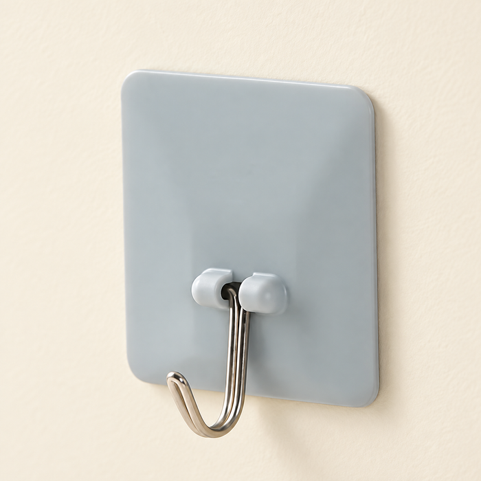 Blue grey adhesive wall hook on ivory wall