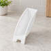 White curved plate organiser on a light kitchen worktop.