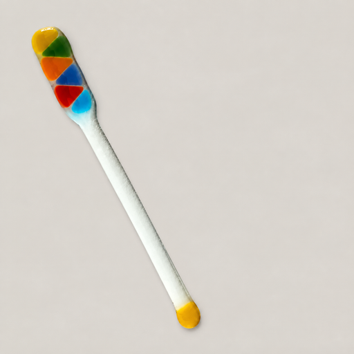 Multicolour glass stirring rod on ivory surface