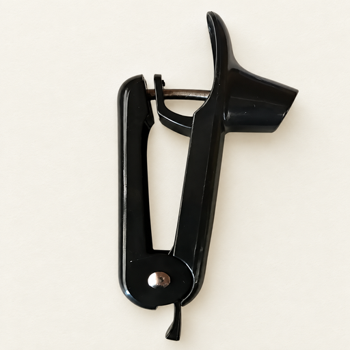 Black cherry pitter on ivory kitchen surface