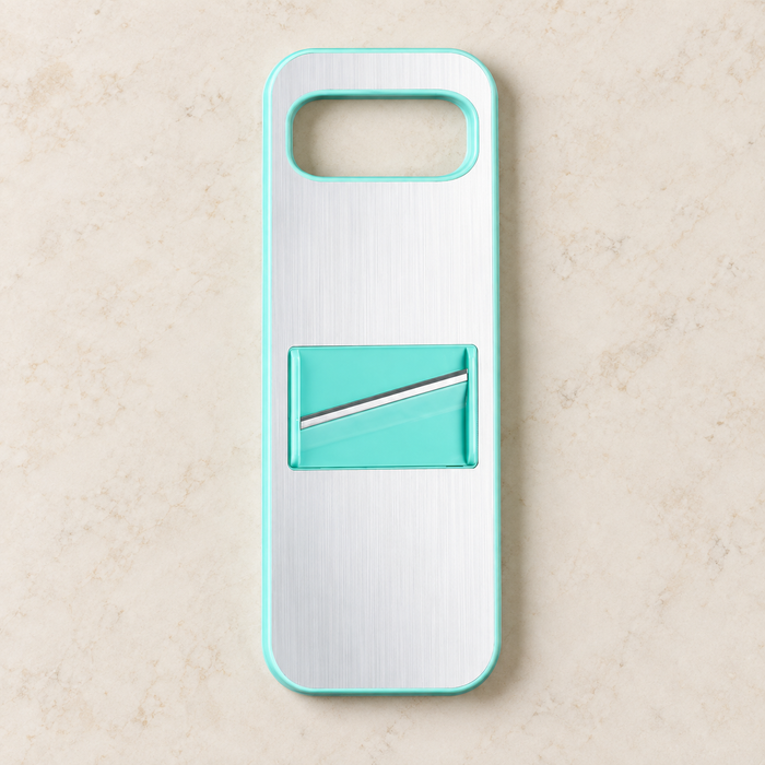 White and mint slicing board on a warm ivory surface