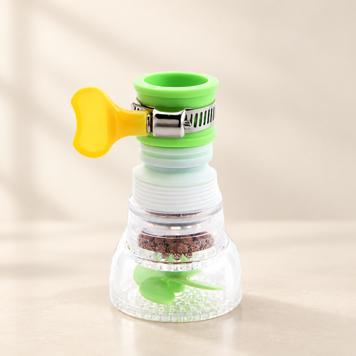 Green and clear faucet filter with yellow clamp tab on ivory counter