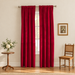 Pair of red curtains in a softly lit ivory room