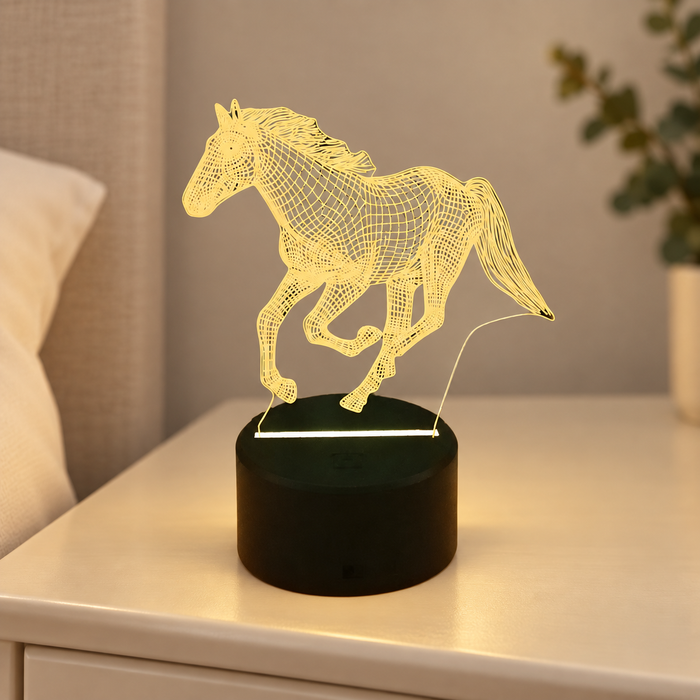 Yellow horse acrylic night light on an ivory bedside table