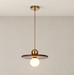 Walnut disc pendant with gold fittings and a glowing globe