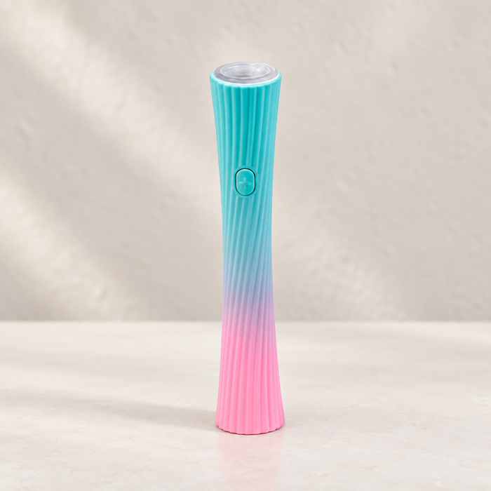 Turquoise and pink handheld manicure lamp