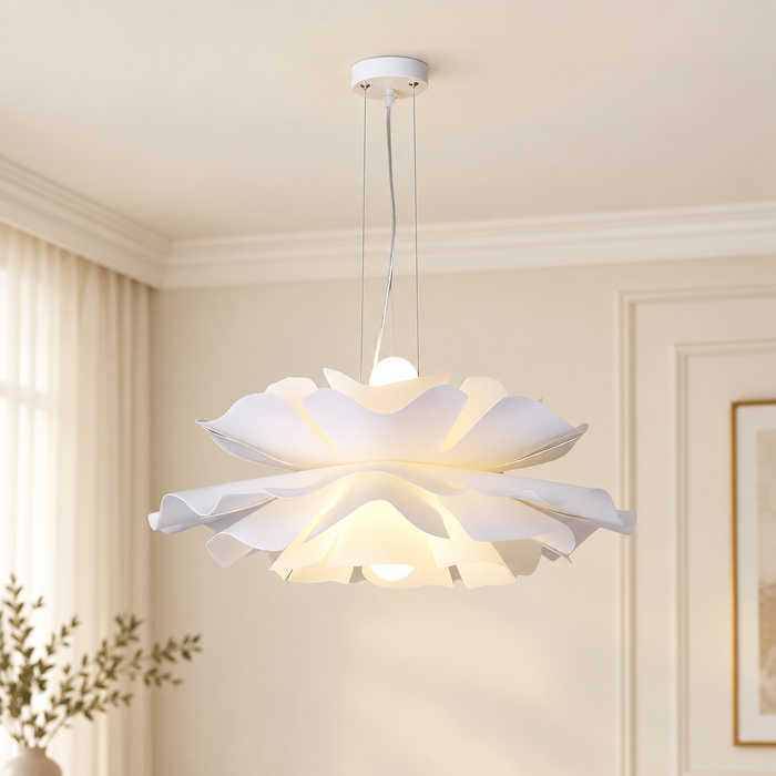 White floral pendant light with layered petals mounted in an ivory interior.