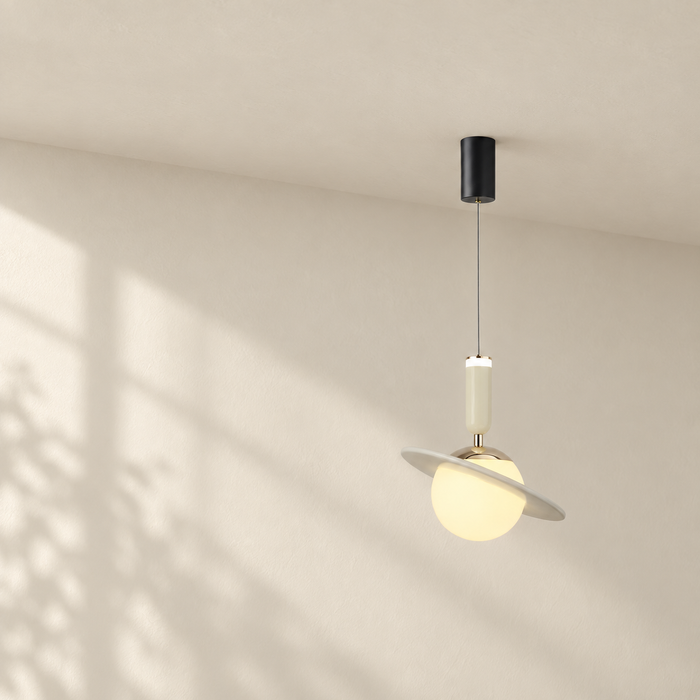 Ivory planet-shaped pendant lamp suspended from a black ceiling canopy