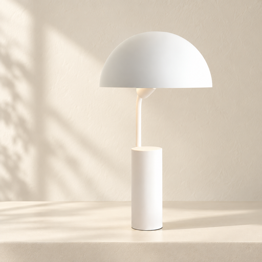 White dome desk lamp with a cylindrical base on an ivory console