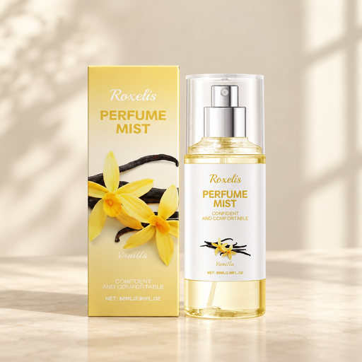 Yellow fragrance mist bottle and matching box on ivory tabletop