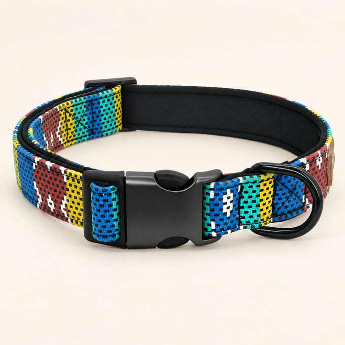 Multicolour adjustable dog collar with blank black buckle on ivory surface
