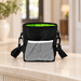 Black treat pouch with white mesh pocket and lime lining on an ivory console.