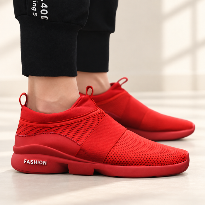 Red mesh slip-on athletic shoes with broad straps and FASHION heel lettering