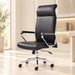 Black high-back office chair in an ivory interior