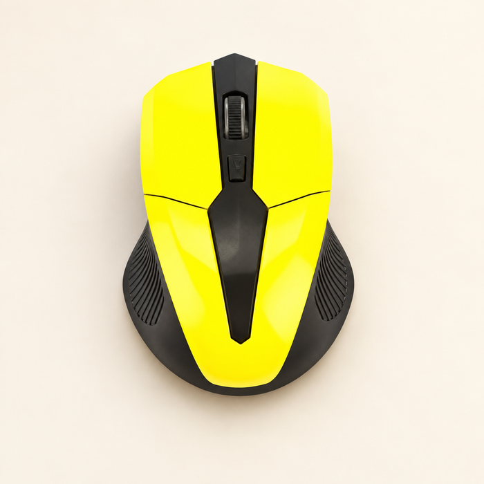 Yellow and black wireless mouse on warm ivory surface