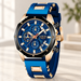 Blue and gold watch with a black bezel and three small dial displays.