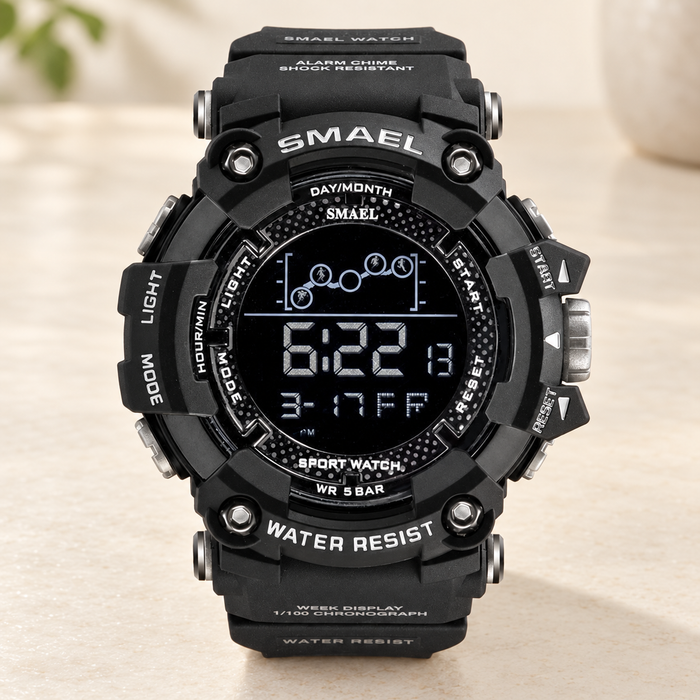 Black digital sports watch with its original display on an ivory surface.