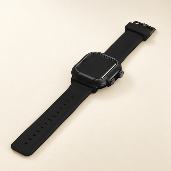 Black sport watch strap and protective case assembly on ivory surface