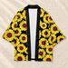 Black open cardigan with yellow sunflower print on ivory linen.