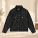 Black biker jacket with silver snaps in a softly lit ivory dressing room