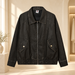 Dark distressed zip jacket with gold pocket snaps in an ivory dressing room