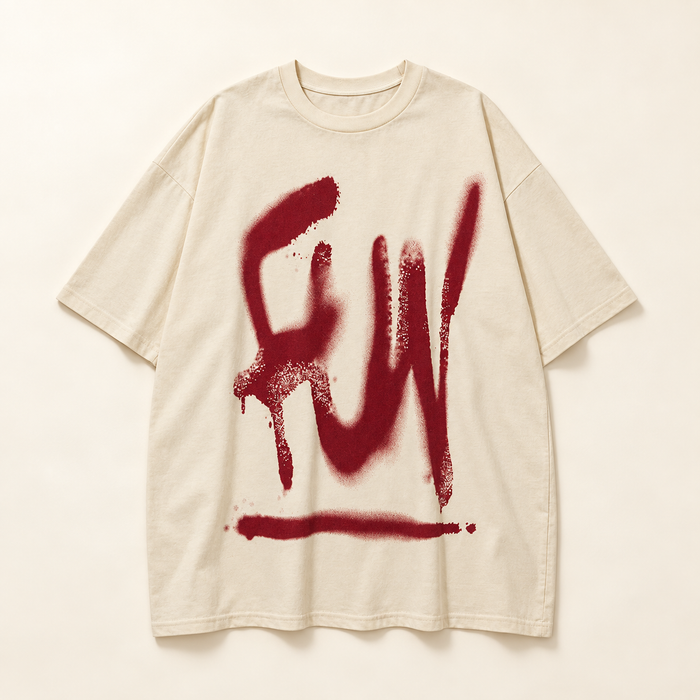 Cream tshirt with dark red graffiti print on ivory surface