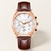 RONMAR watch with brown leather strap and white chronograph-style dial on an ivory surface