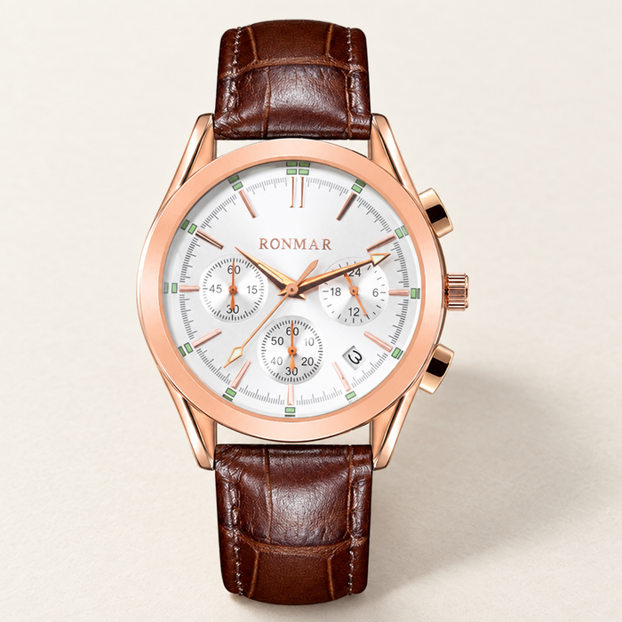 RONMAR watch with brown leather strap and white chronograph-style dial on an ivory surface