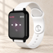 White smart bracelet displaying music controls on an ivory surface.