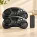 Two black game controllers and receiver on an ivory tabletop