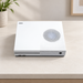 White XGAME console on a light stone media-room surface