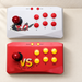 White and red arcade controllers on an ivory tabletop
