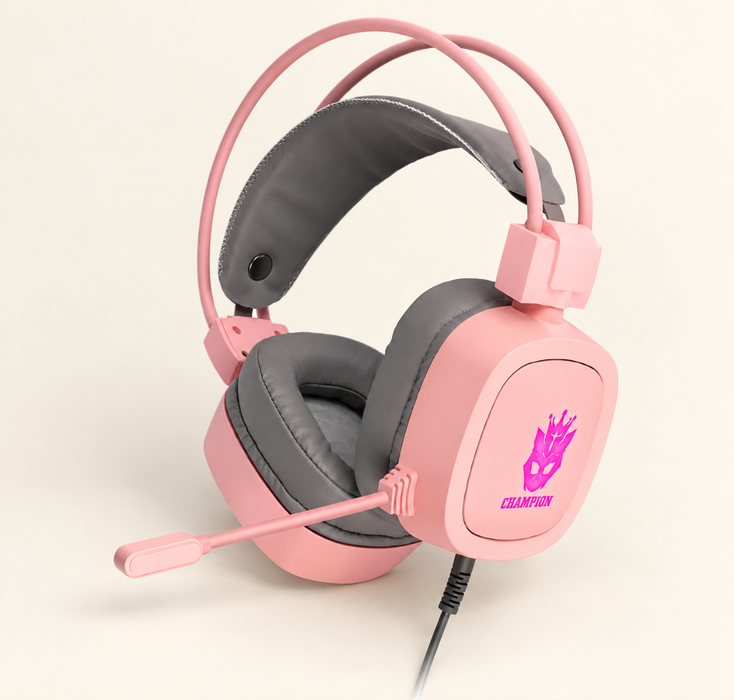 Pink and grey gaming headset with boom microphone on an ivory surface