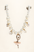 White pearl necklace with enamel charms and a ballerina pendant on two supports
