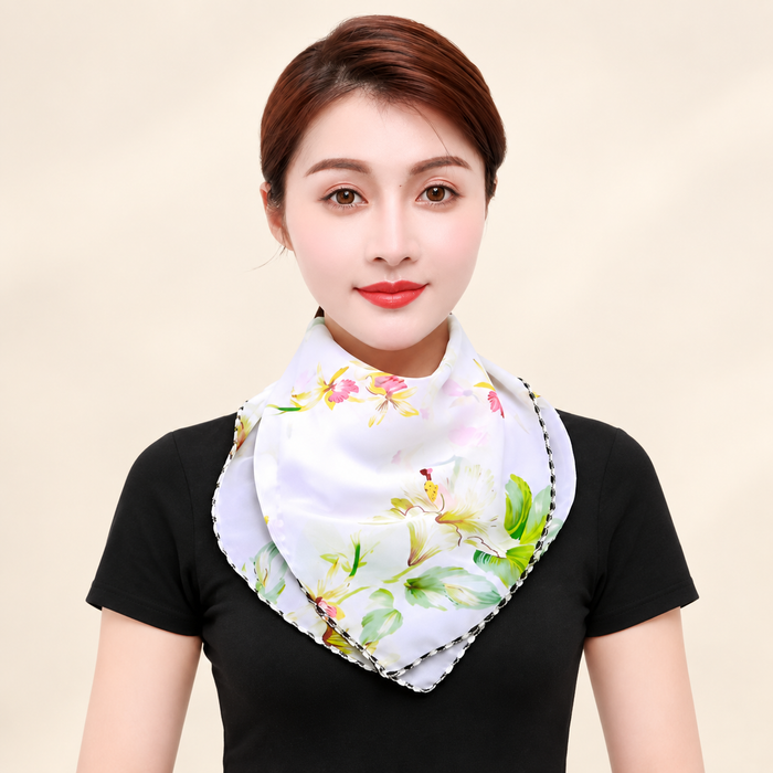 White floral neck scarf with contrasting trim on model