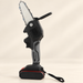 Compact black and grey pruning saw with wrist strap