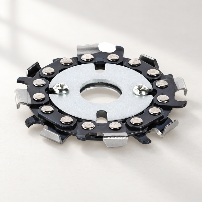 Chain cutting disk with silver centre plate on an ivory surface