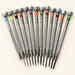 Thirteen metal precision screwdrivers arranged in a fan with coloured collars