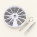 Round repair-parts organizer with a keyring screwdriver and tweezers on an ivory surface