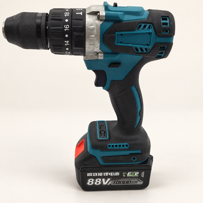 Teal and black cordless drill standing on its battery on an ivory surface
