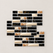Three overlapping black and gold decorative tile sticker sheets