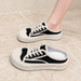 Black and cream mule sneakers