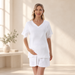 White V-neck maternity lounge top and shorts in an ivory interior