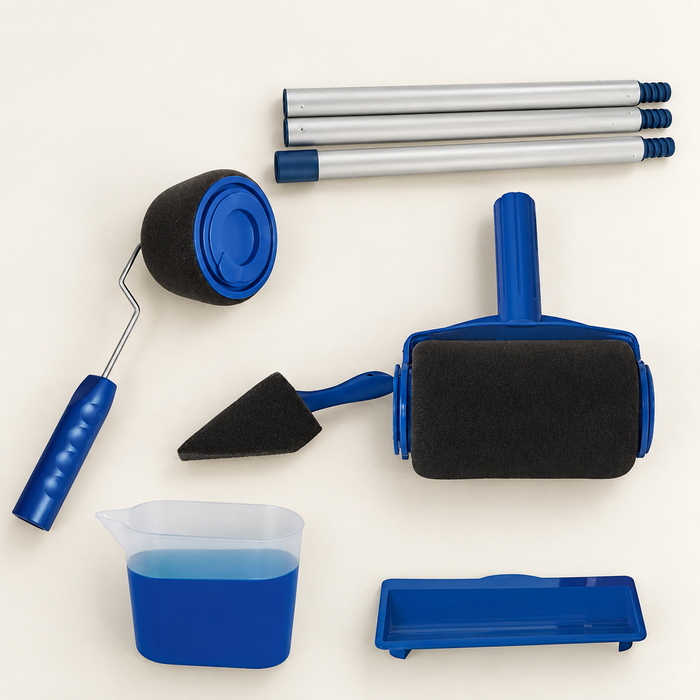 Blue painting roller kit arranged on an ivory worktable.